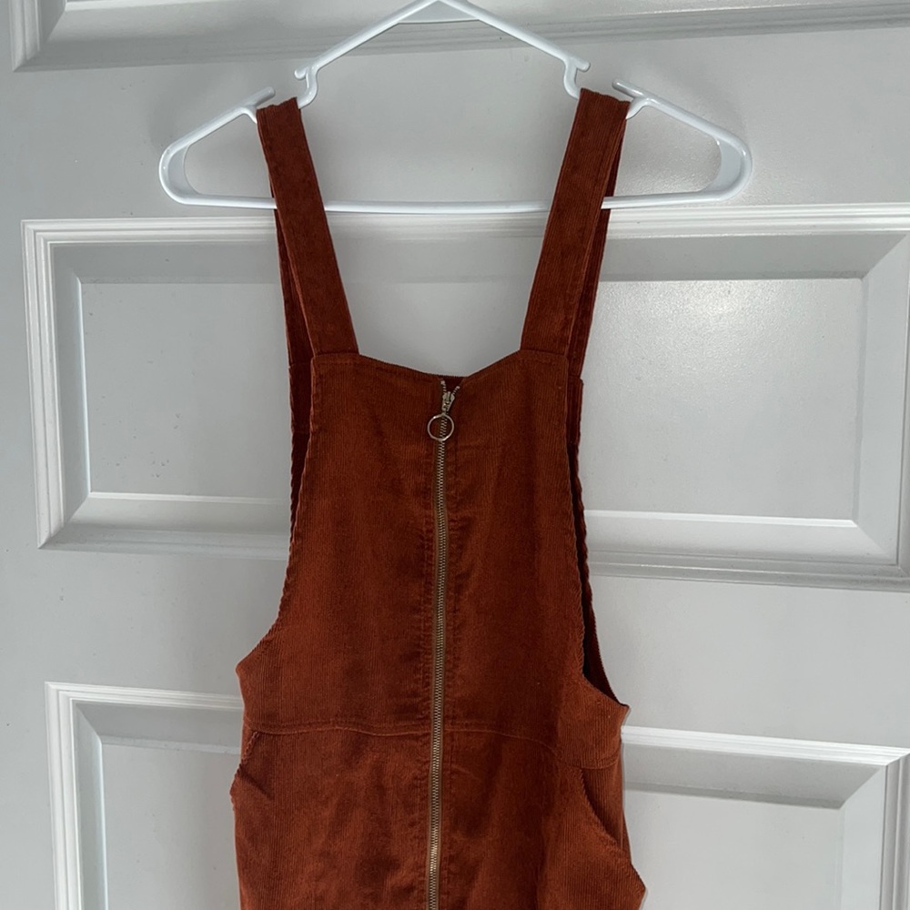 Super cute over all dress with pockets